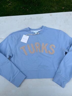 Light Blue Crewneck Sweater with Beige 'TURKS' Chenille Lettering